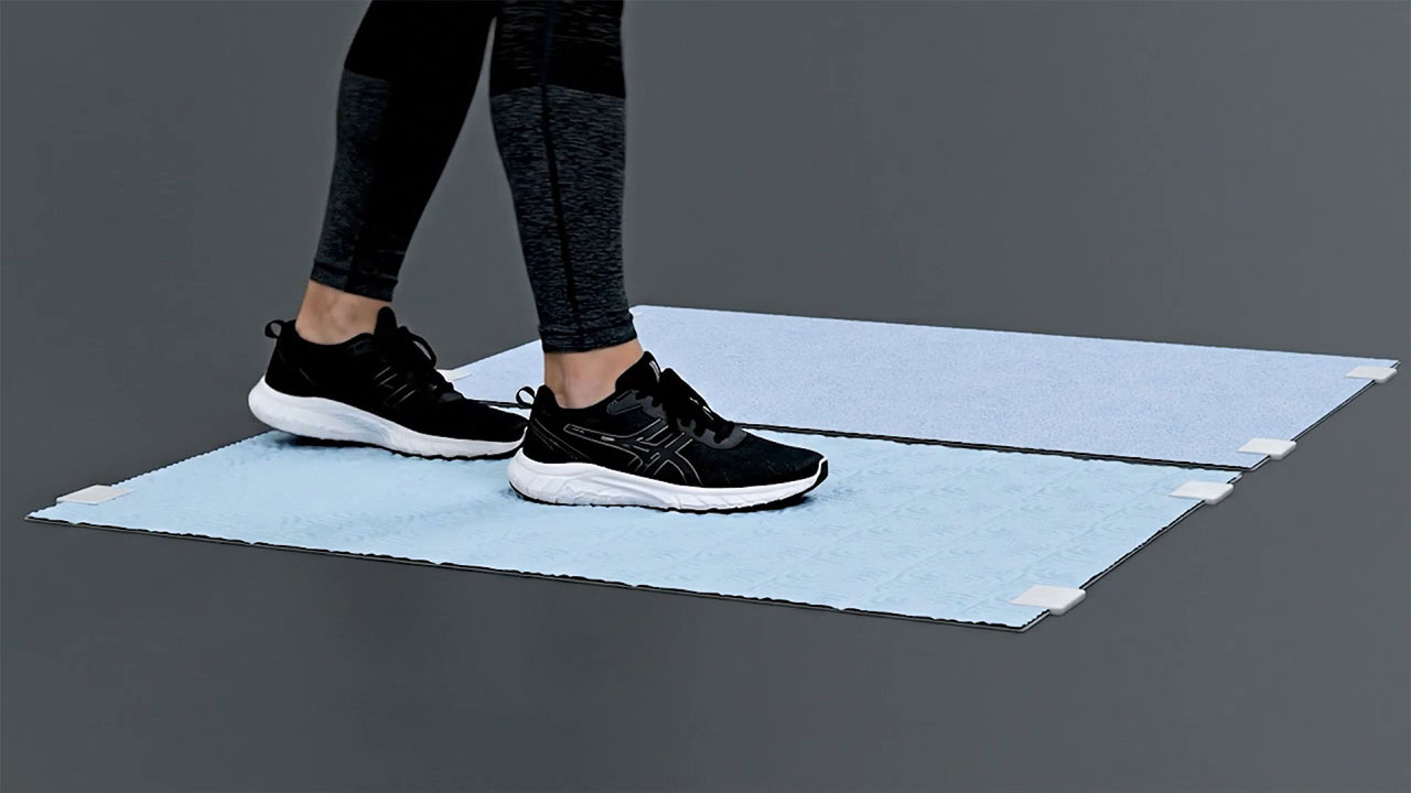 Dual trays that sanitize and dry shoe soles